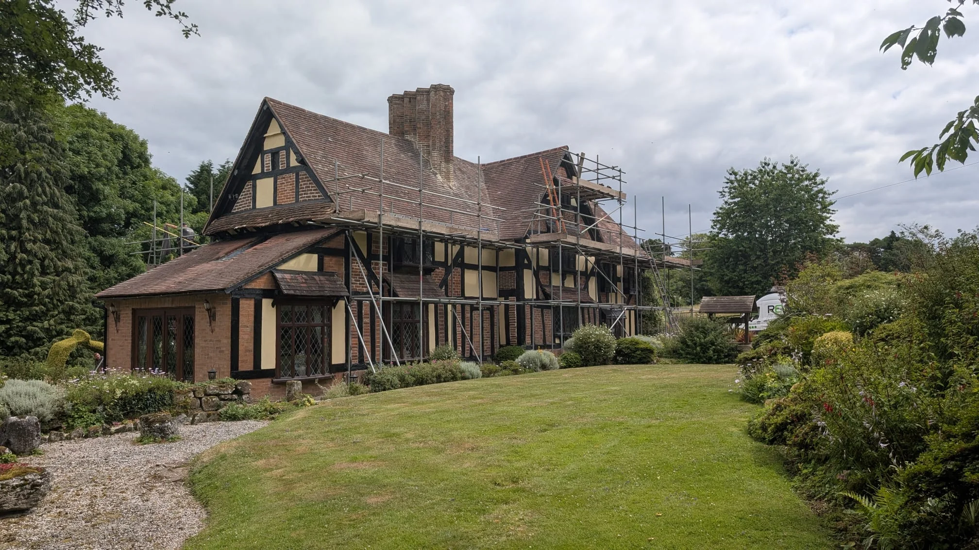 New roof using existing and additional reclaimed roof and ridge tiles